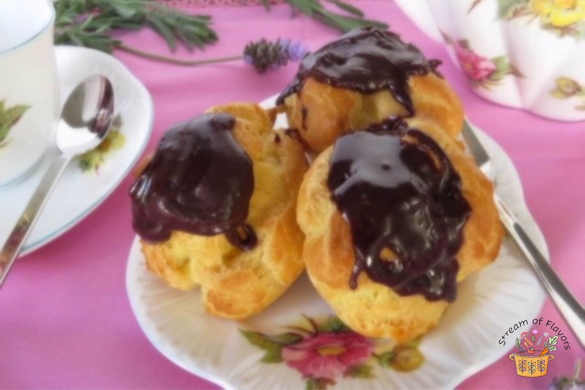 Profiteroles with chocolate sauce on a plate