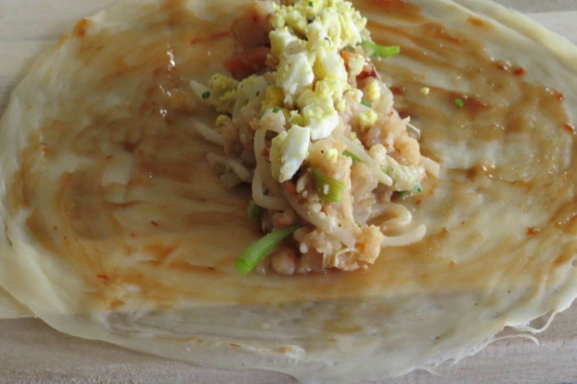 Put crushed boiled eggs on top