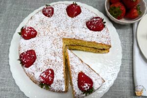 Victoria sandwich cake with strawberries on top