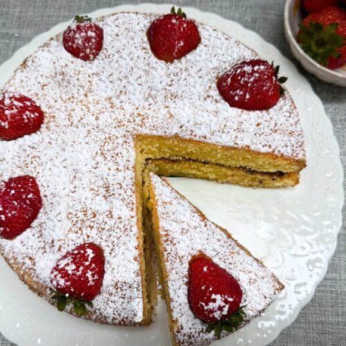 Victoria sandwich cake with strawberries on top