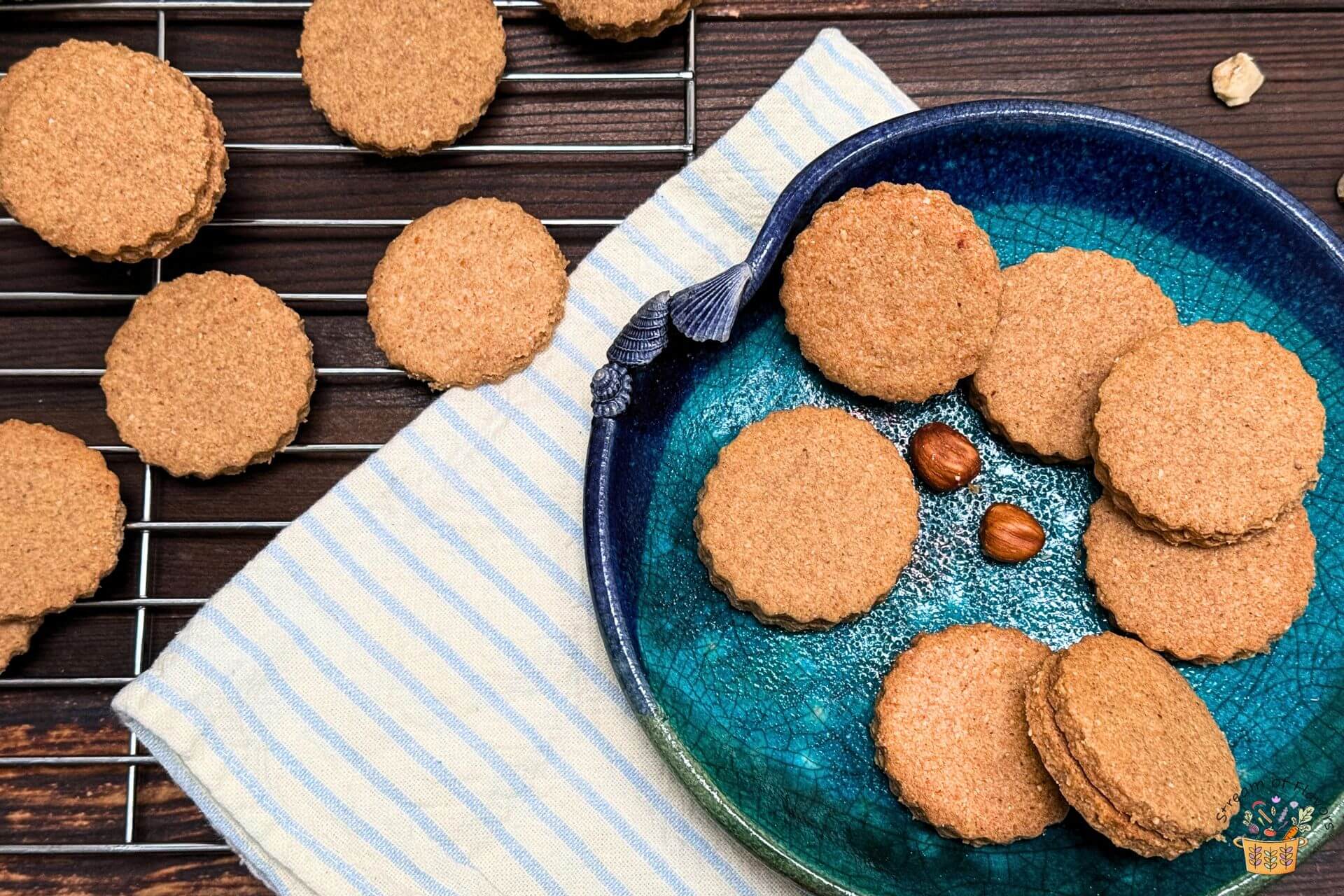 ground hazelnut cookies on a blue plate