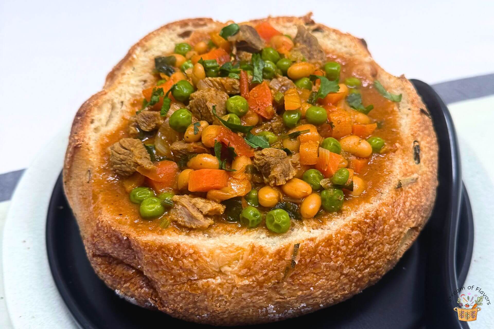 indian lamb stew in a bread boule