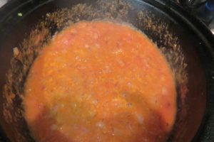 add the tomato puree