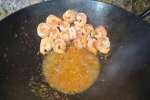 spice paste with shrimp in a wok