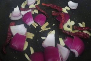 saute the dried chilis and onion petals