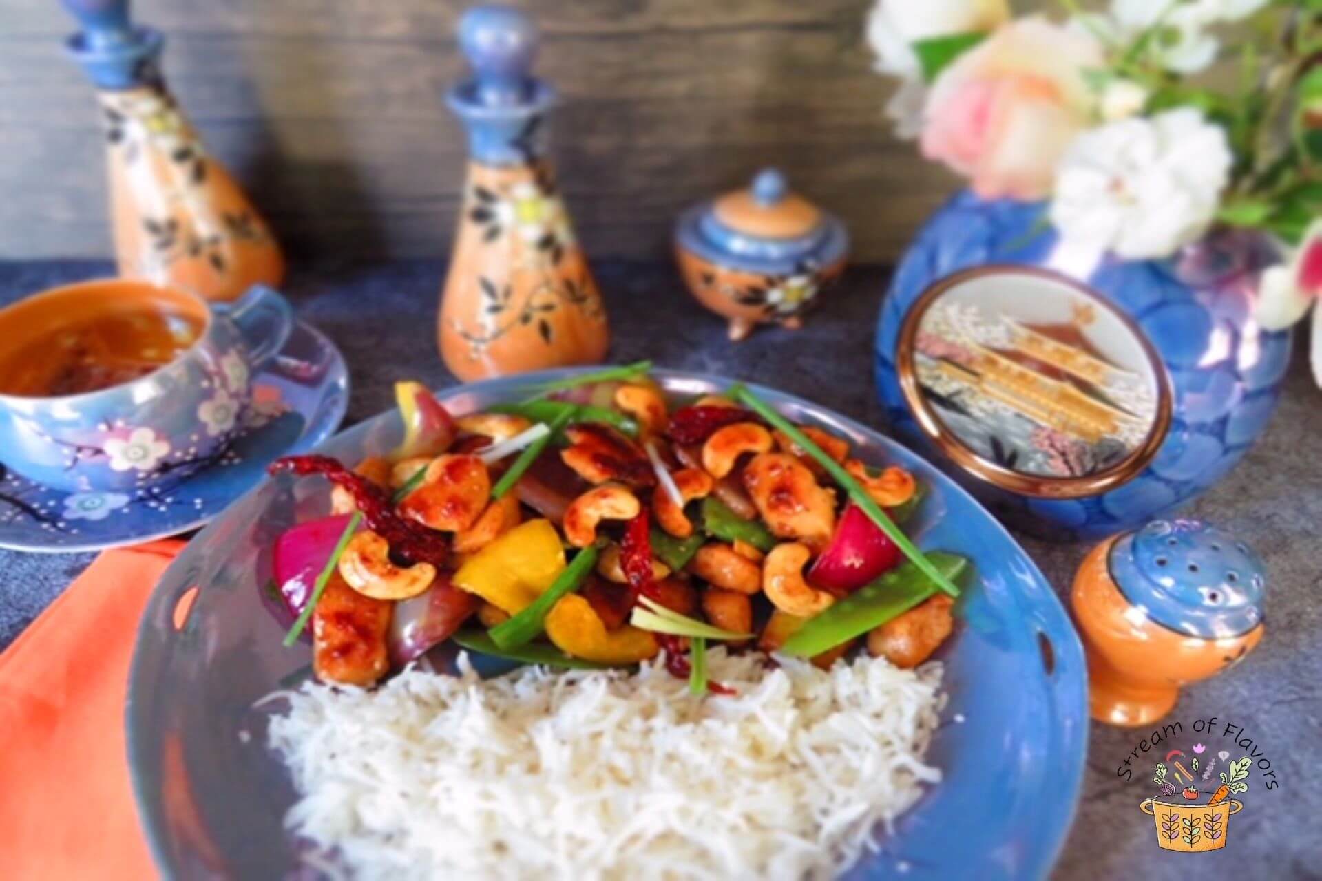 Cashew Chicken Recipe served with rice on a plate