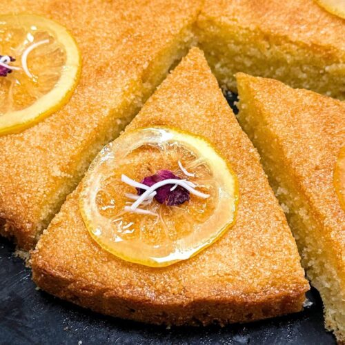 Greek semolina cake revani with lemon slices on top