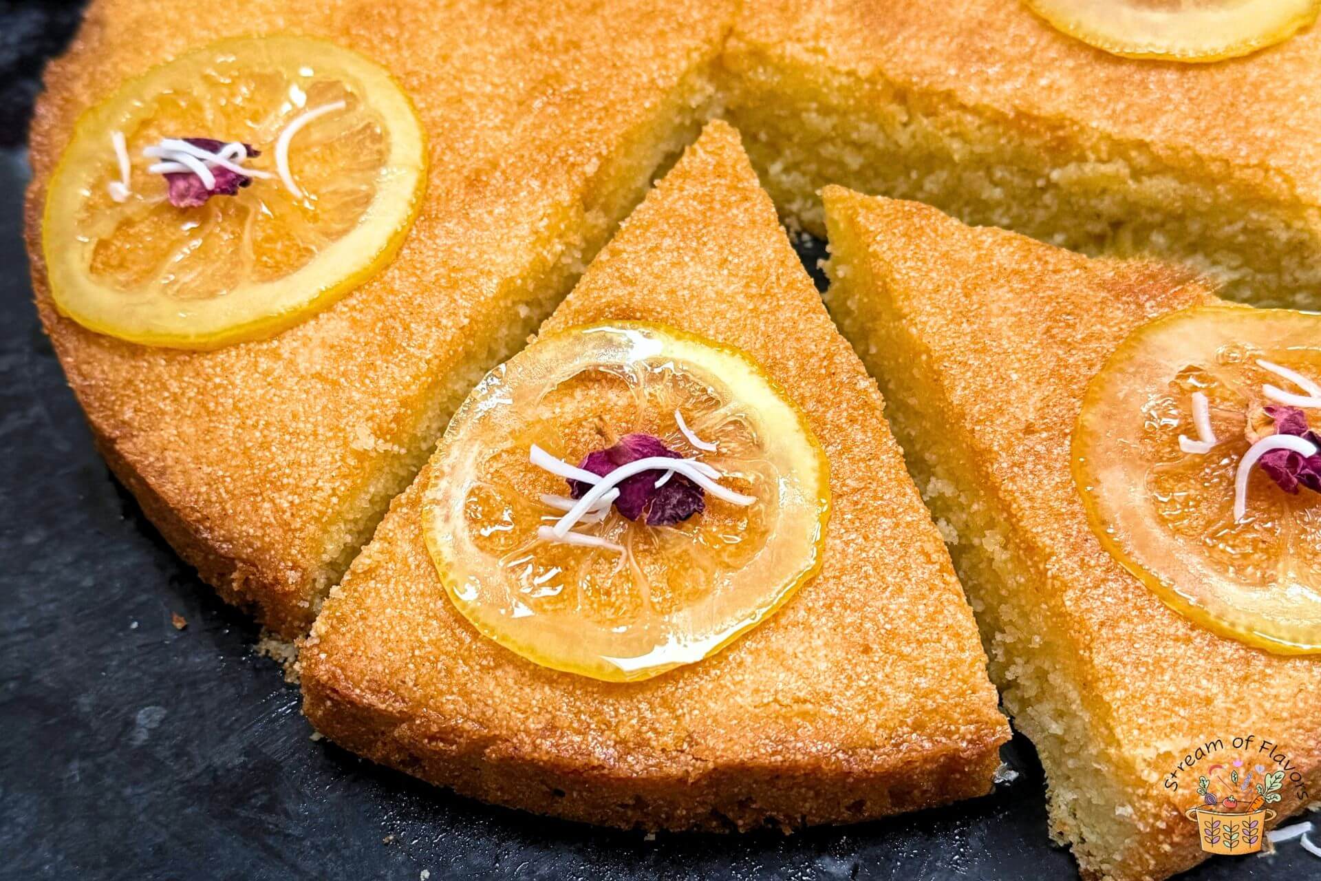 Greek semolina cake revani with lemon slices on top