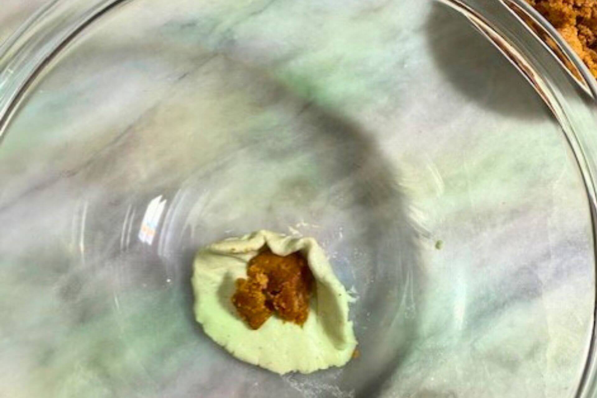 glutinous rice flour disc filled with gula Melaka