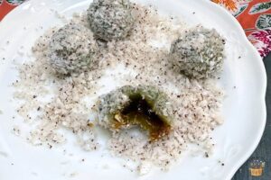 ondeh ondeh ball cut open open with the melted gula Melaka inside