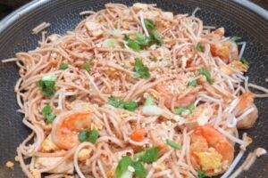 pad thai with peanuts, scallions and cilantro