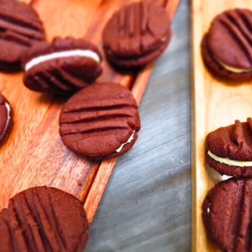 chocolate sandwich cookies recipe on a wooden platter