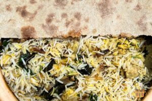 chicken dum biryani recipe with wheat dough cut open