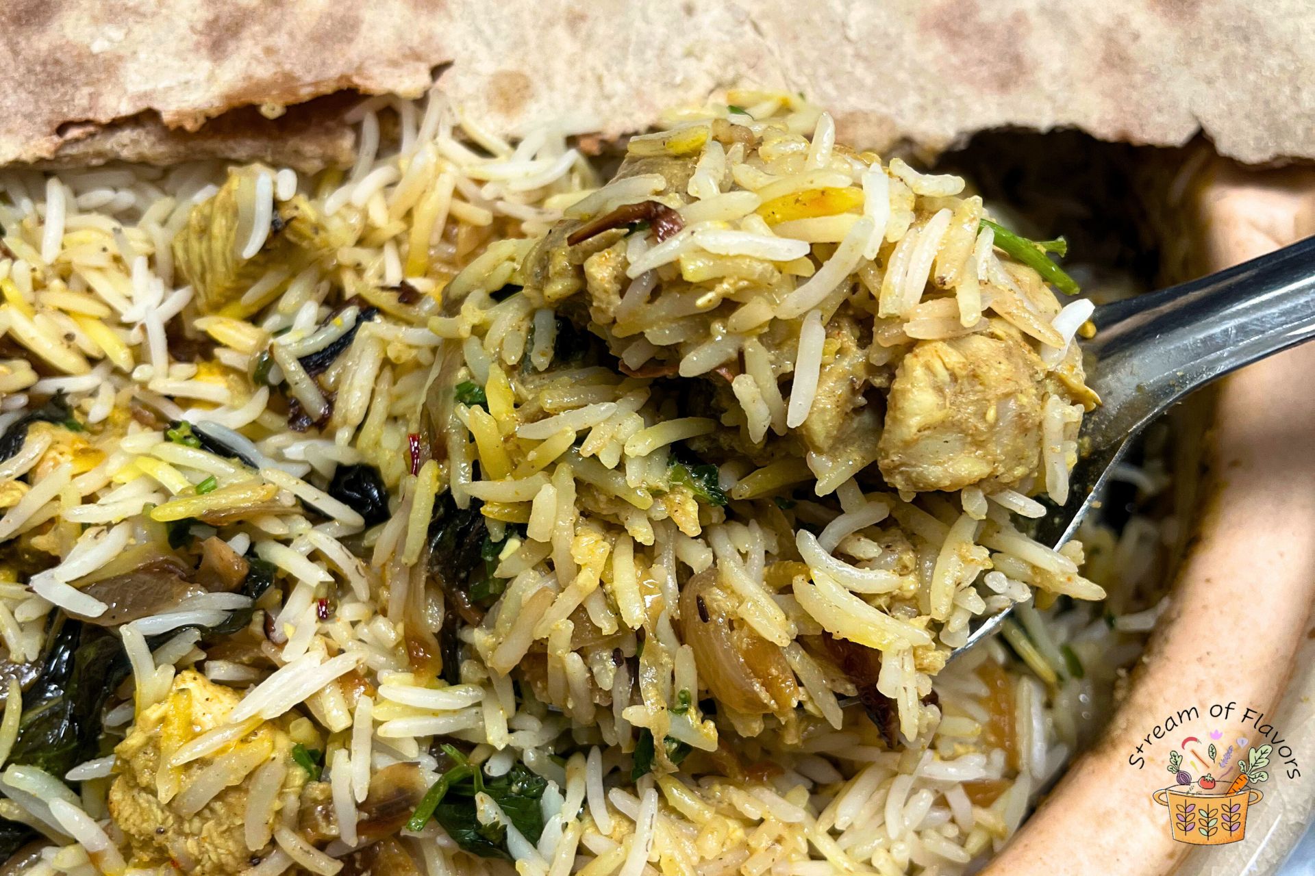 chicken dum biryani recipe in a clay pot covered partially with wheat bread