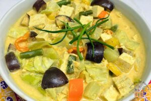 sayur lodeh in a white bowl