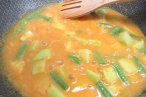 green beans with chayote in a pot