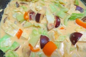 sayur lodeh with coconut milk, veggies and tofu in the wok