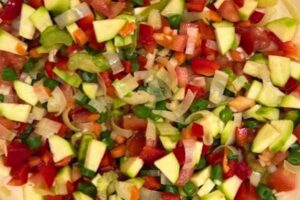 zucchini, pepper and tomato added to the pot