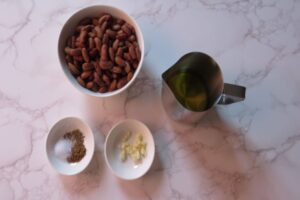 ingredients for refried beans in bowls