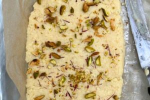 kalakand with pistachios in a tray