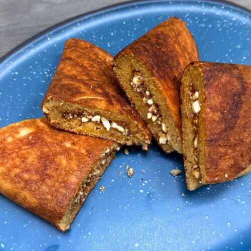malaysian peanut pancake on a blue platter