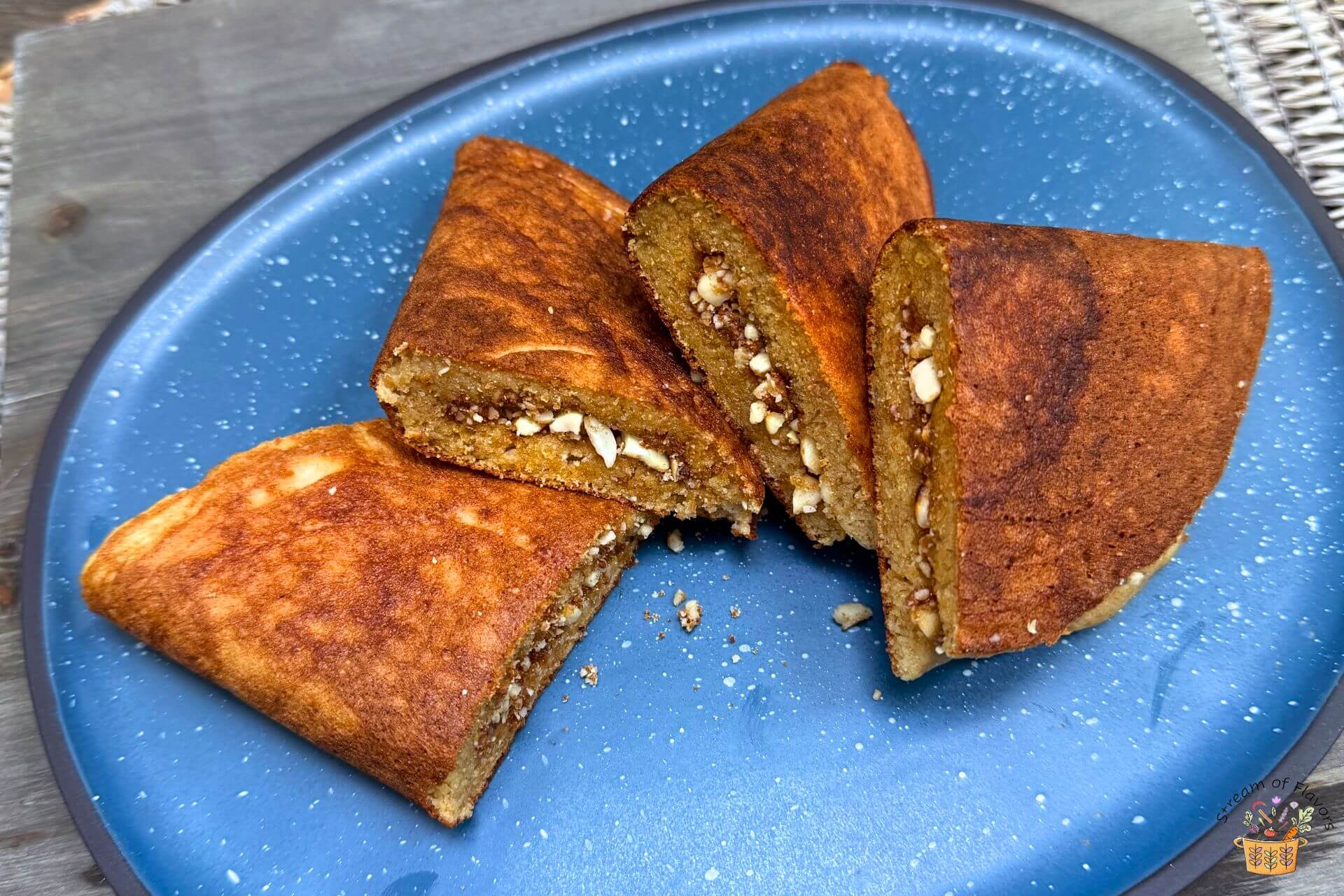 malaysian peanut pancake on a blue platter