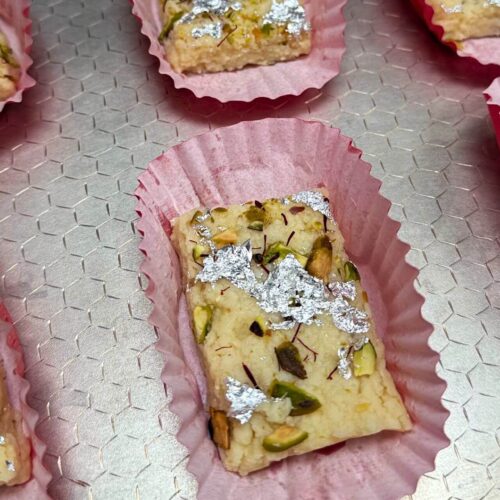 kalakand with condensed milk on a silver tray