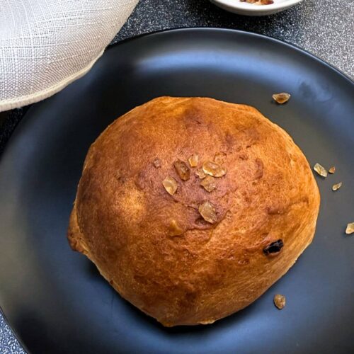 Bath buns on a black plate