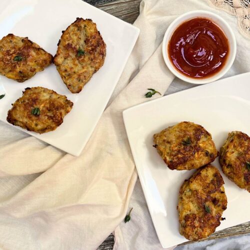 chicken rissole in white plates with ketchup