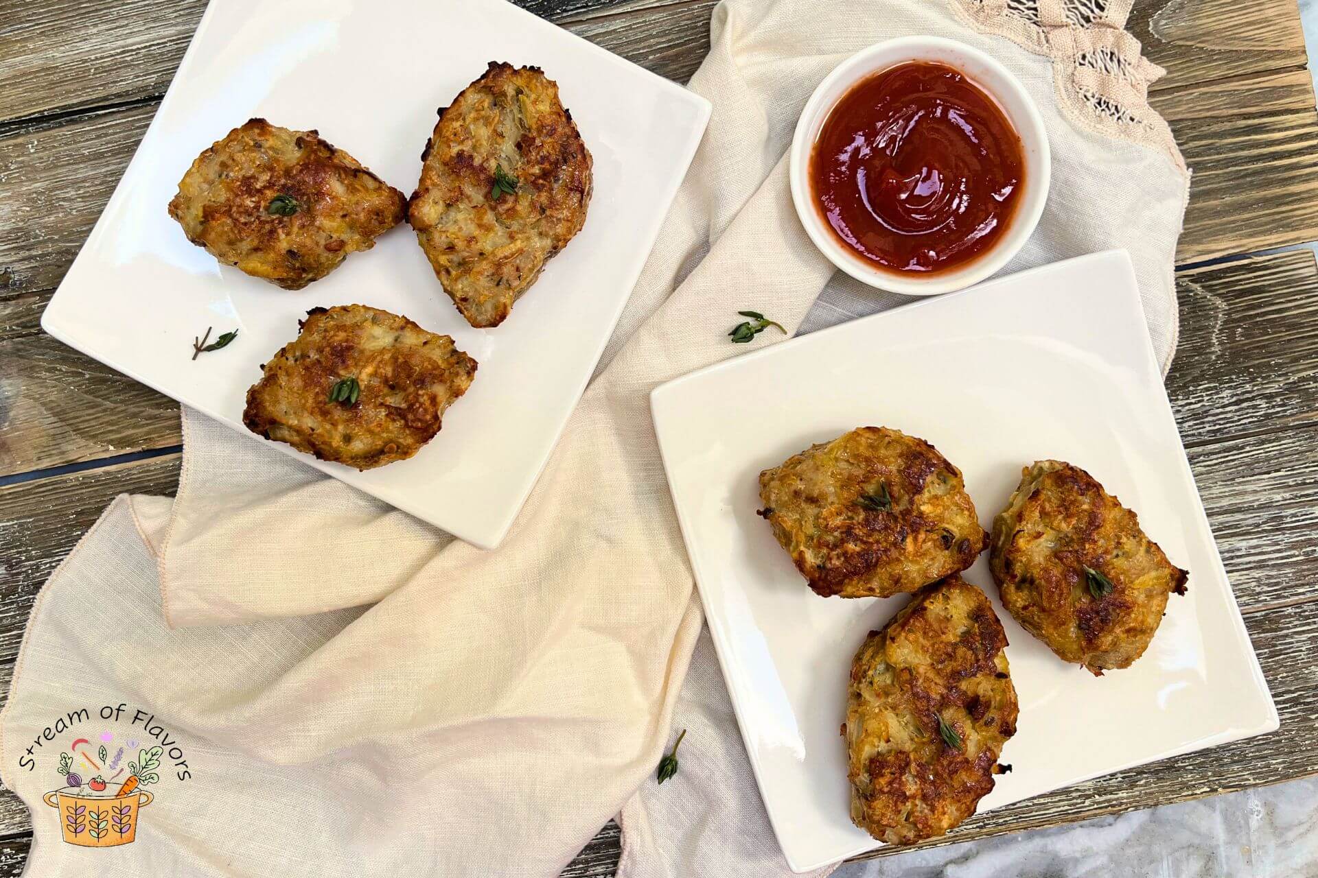 chicken rissole in white plates with ketchup