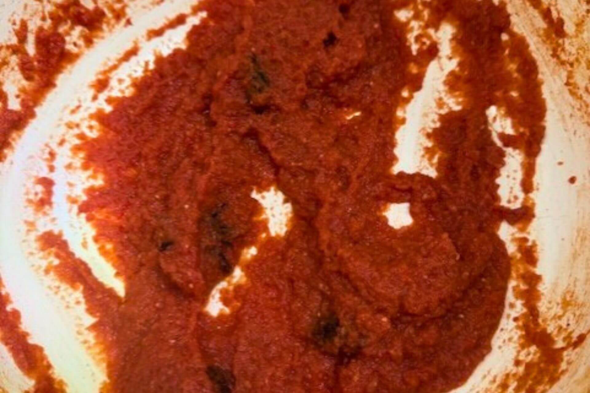 tomato puree until thickened