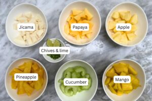 measured ingredients for the rujak salad recipe in bowls