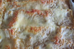 bake the ground chicken lasagna until golden on top