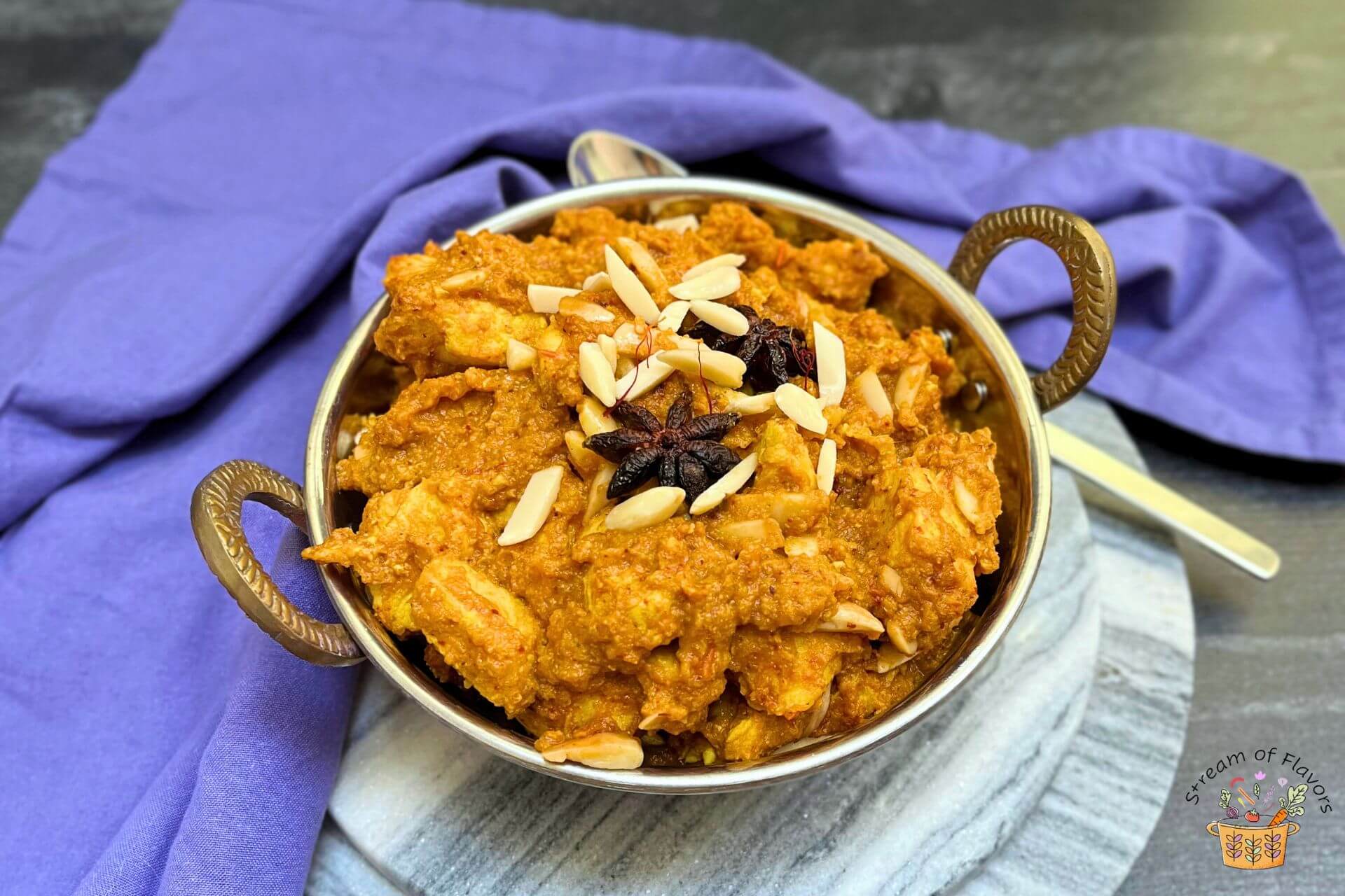 chicken pasanda recipe with star anise and almonds in a kadai