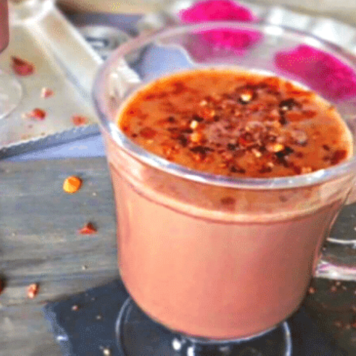 easy to make hot chocolate in glasses with hazelnuts on top