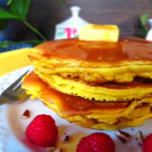 healthy pumpkin pancakes stacked on a plate