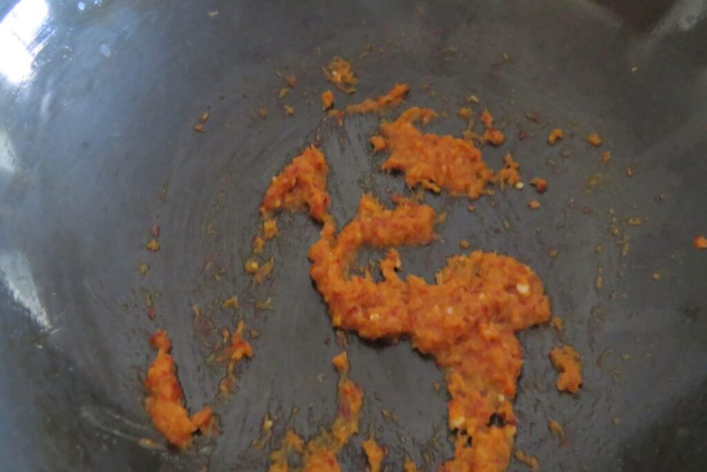 spice paste in a wok