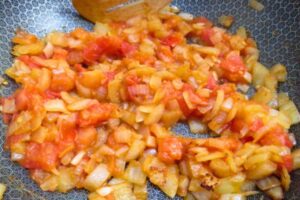 onion and tomato mixture sauteed