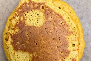 pumpkin pancake on a griddle