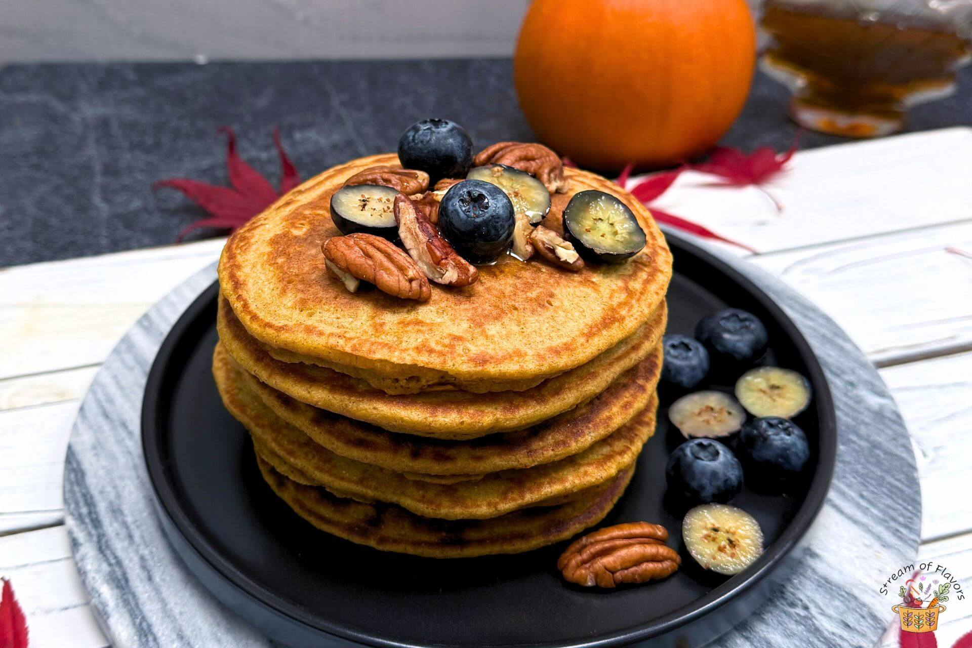 whole wheat pumpkin pancakes with blueberries