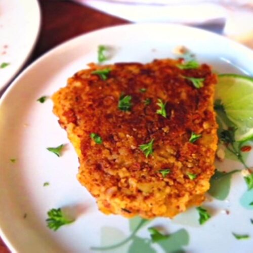 almond crusted cod with parsley on top
