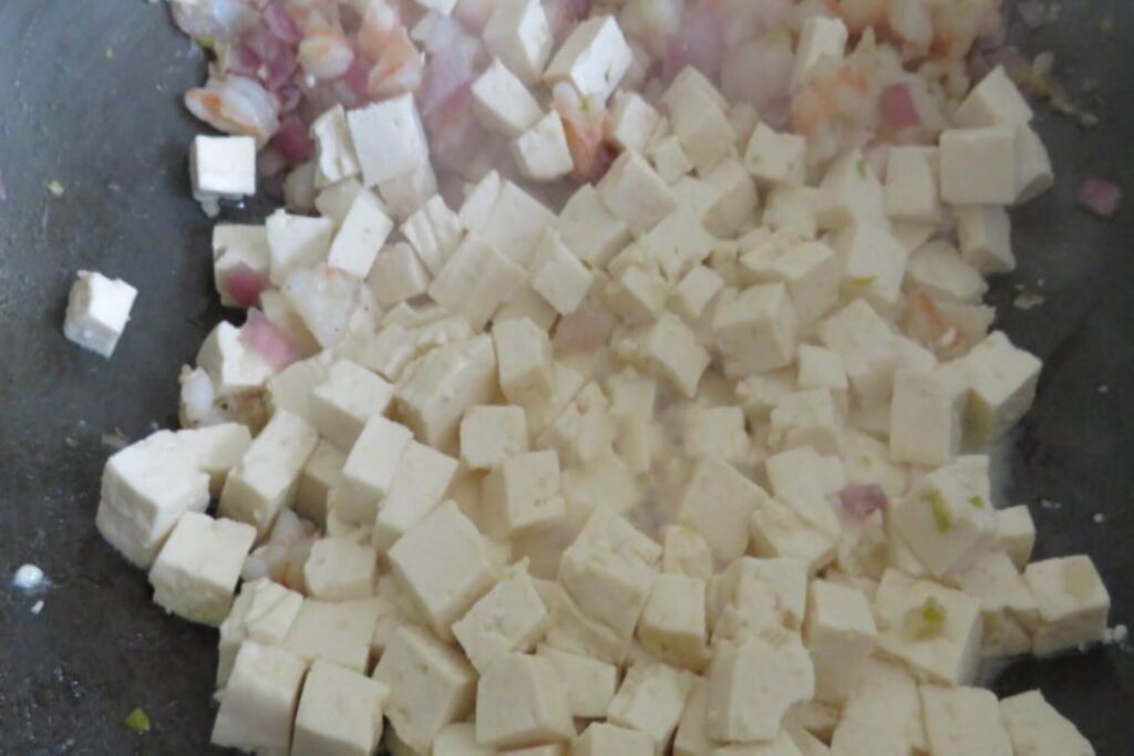 tofu cubes in a wok