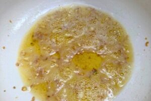 garlic with olive oil in a Dutch oven