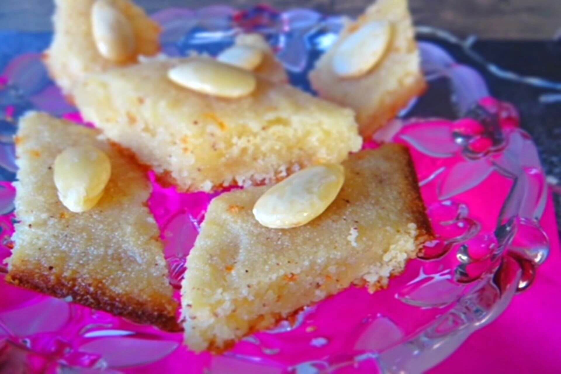 basbousa garnished with blanched almonds