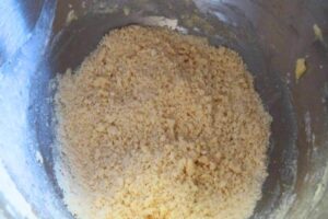 flour added to the butter and sugar mixture