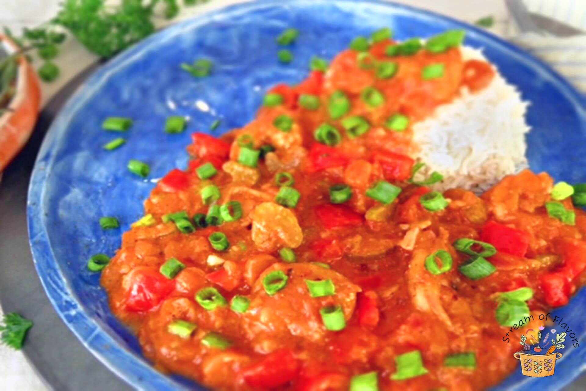 easy shrimp creole on a plate with rice