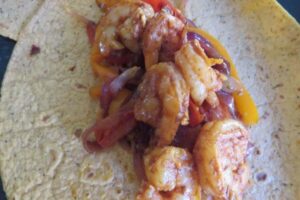 shrimp and peppers on healthy shrimp fajitas