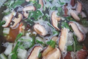 shiitake in vegetable stock with bok choy