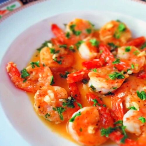 easy garlic butter shrimp in a white plate