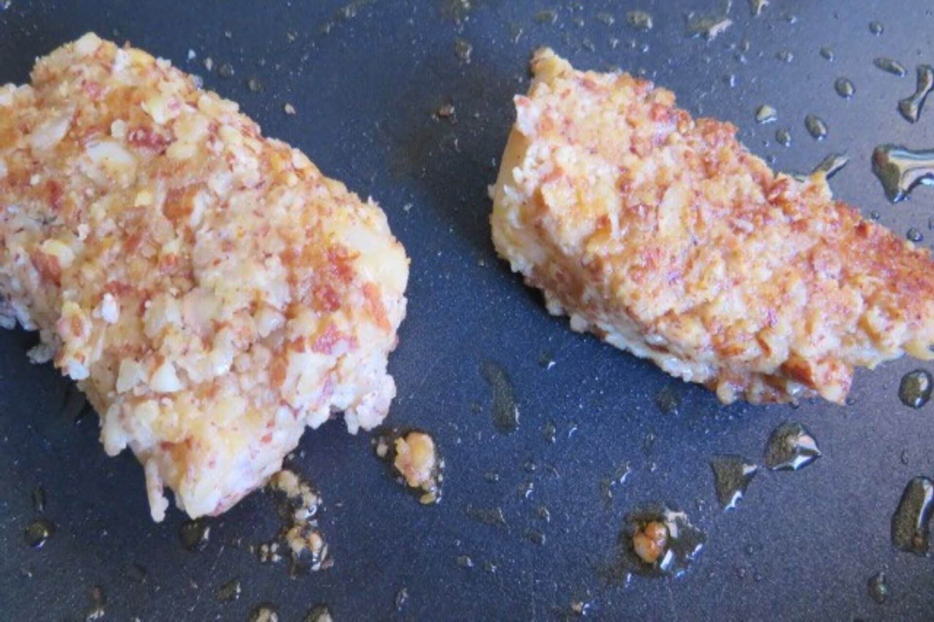 almond crusted cod flipped over